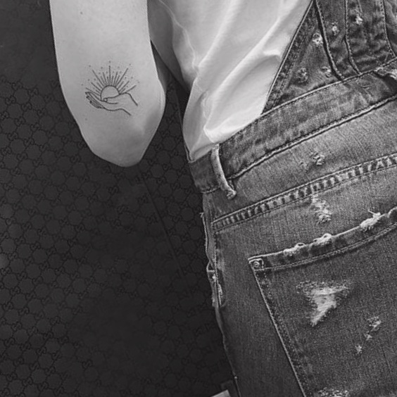 Tattoo chiquito de Sol en Madriz